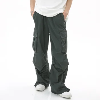 Винтажная мужская одежда SYUHGFA, модный комбинезон, летняя новинка, повседневные широкие брюки в стиле хип-хоп Сафари со свободными карманами, трендовые плиссированные брюки